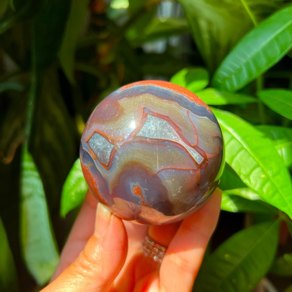 Volcanic agate sphere (Q) | crystal (uv reactive)